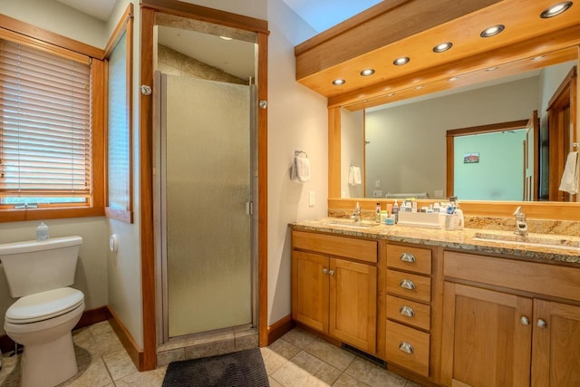 303 Rimrock Rd, Wausau, WI 54401 - full bathroom with double vanity, a shower stall, recessed lighting, and tile patterned flooring