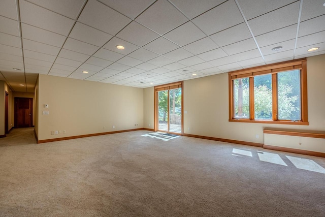 303 Rimrock Rd, Wausau, WI 54401 - spare room featuring carpet floors, a paneled ceiling, and recessed lighting