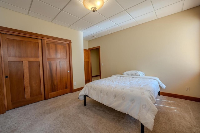 303 Rimrock Rd, Wausau, WI 54401 - bedroom featuring light carpet and a paneled ceiling