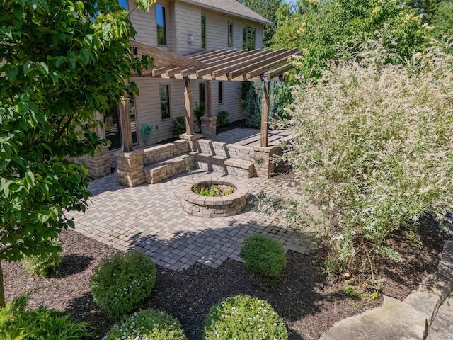 303 Rimrock Rd, Wausau, WI 54401 - view of patio / terrace featuring a pergola and a fire pit