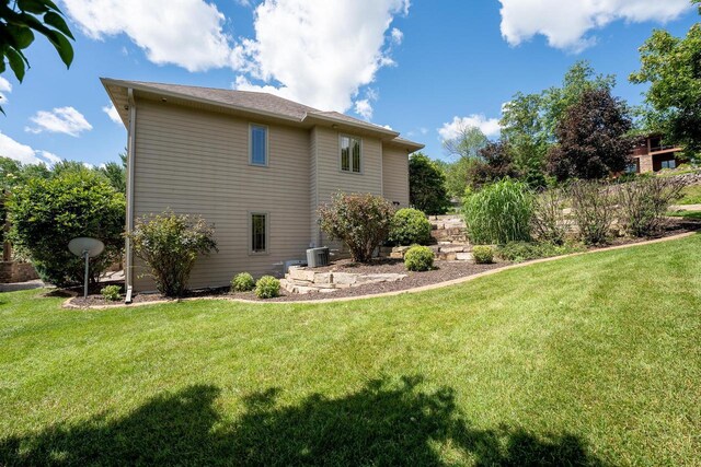 303 Rimrock Rd, Wausau, WI 54401 - back of property with a yard