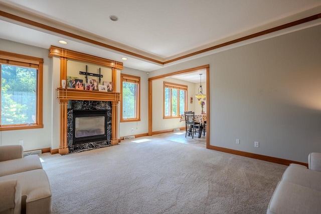 303 Rimrock Rd, Wausau, WI 54401 - living room with a high end fireplace, carpet floors, and recessed lighting