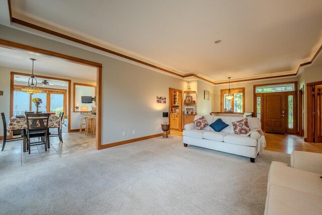 303 Rimrock Rd, Wausau, WI 54401 - living area featuring light colored carpet and ornamental molding