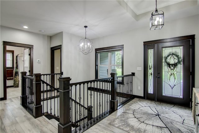 2247 105th St, Eau Claire, WI 54703 - foyer entrance with a chandelier, light wood-style flooring, and recessed lighting