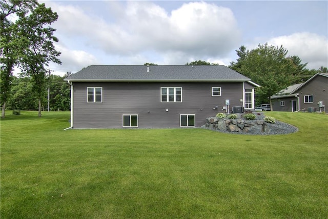 2247 105th St, Eau Claire, WI 54703 - rear view of property with a yard