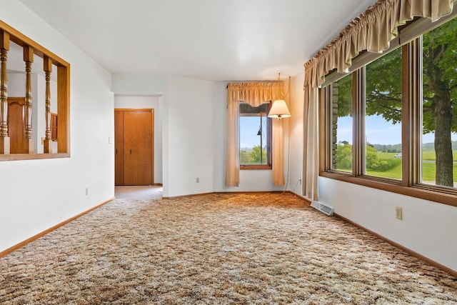 2929 Brunner Rd, Manitowoc, WI 54220 - carpeted spare room featuring baseboards