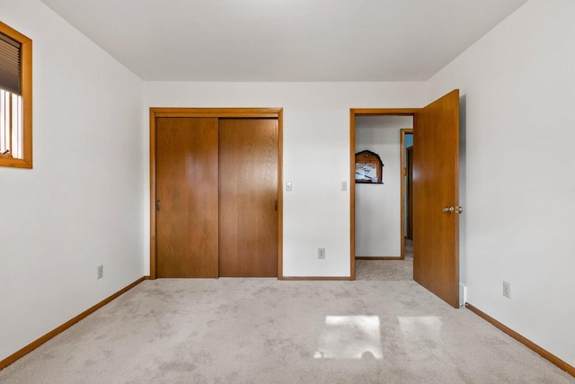 2929 Brunner Rd, Manitowoc, WI 54220 - unfurnished bedroom with carpet flooring and a closet