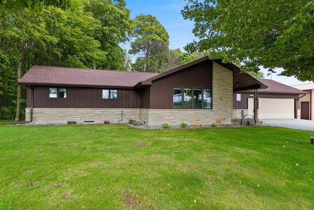 2929 Brunner Rd, Manitowoc, WI 54220 - view of front of property featuring stone siding, a front yard, and driveway