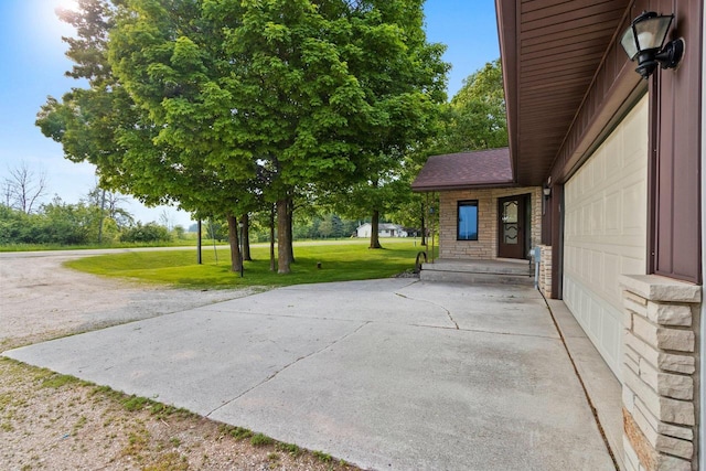 2929 Brunner Rd, Manitowoc, WI 54220 - view of patio / terrace featuring driveway