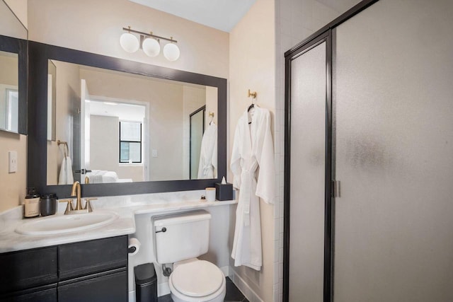 234 N Broadway Unit 402, Milwaukee, WI 53202 - bathroom featuring connected bathroom, a stall shower, and vanity