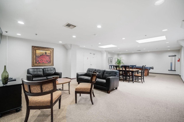 234 N Broadway Unit 402, Milwaukee, WI 53202 - living area with light carpet, a skylight, and recessed lighting