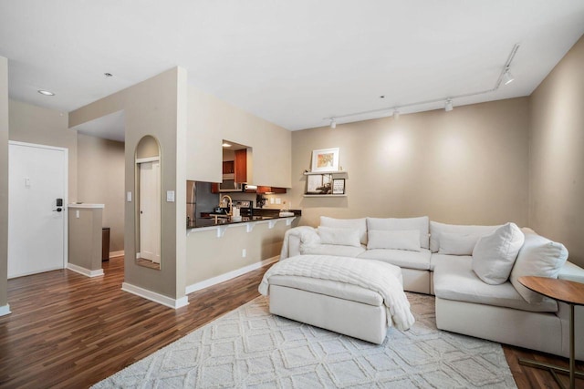 234 N Broadway Unit 402, Milwaukee, WI 53202 - living area featuring track lighting and wood finished floors