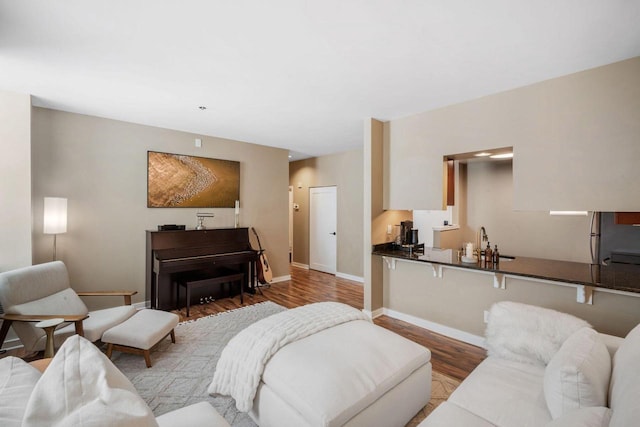 234 N Broadway Unit 402, Milwaukee, WI 53202 - living area with wood finished floors and baseboards