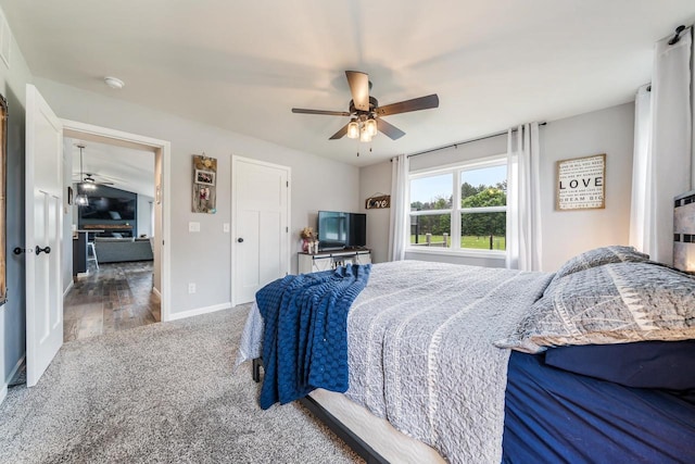 N3366 Flynn Dr, Montello, WI 53949 - carpeted bedroom featuring baseboards and ceiling fan