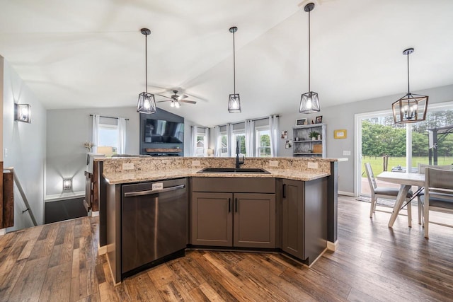 N3366 Flynn Dr, Montello, WI 53949 - kitchen featuring dishwasher, vaulted ceiling, dark wood-style floors, hanging light fixtures, and open floor plan