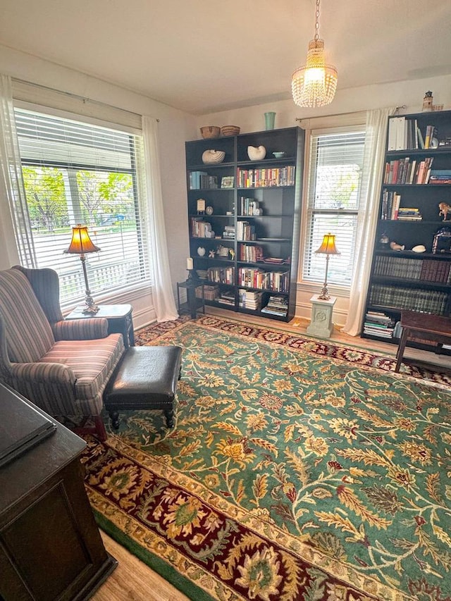 303 E 5th St, Washburn, WI 54891 - living area with a chandelier and wood finished floors