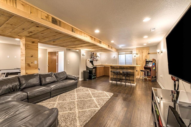 739 Pinehurst Dr, Mukwonago, WI 53149 - living area featuring dark wood-type flooring, recessed lighting, and a textured ceiling