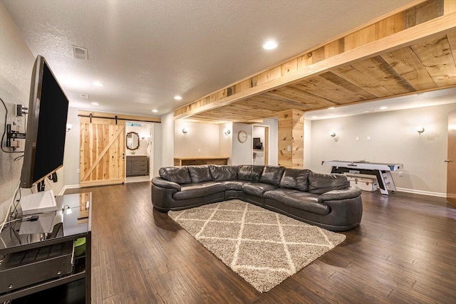 739 Pinehurst Dr, Mukwonago, WI 53149 - living room with a barn door, dark wood finished floors, recessed lighting, and a textured ceiling