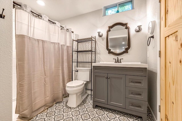 739 Pinehurst Dr, Mukwonago, WI 53149 - bathroom featuring vanity, shower / bath combo with shower curtain, and a textured wall