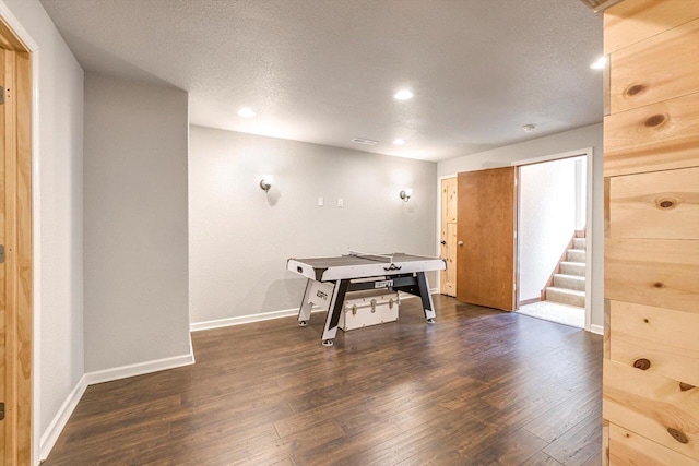 739 Pinehurst Dr, Mukwonago, WI 53149 - recreation room with dark wood finished floors, recessed lighting, and a textured ceiling