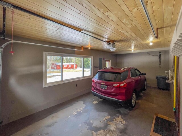 4080 Camp Bryn Afon Rd, Rhinelander, WI 54501 - garage featuring wooden ceiling and baseboards