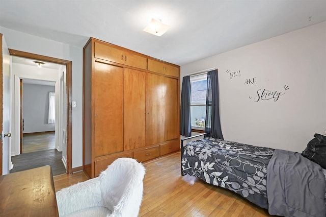 1007 14th Ave, Green Bay, WI 54304 - bedroom with light wood finished floors and a closet