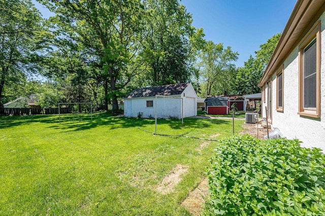 1007 14th Ave, Green Bay, WI 54304 - view of yard featuring a shed and view of wooded area