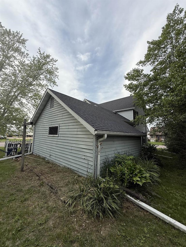 404 Prairie St, Mauston, WI 53948 - view of property exterior featuring a shingled roof