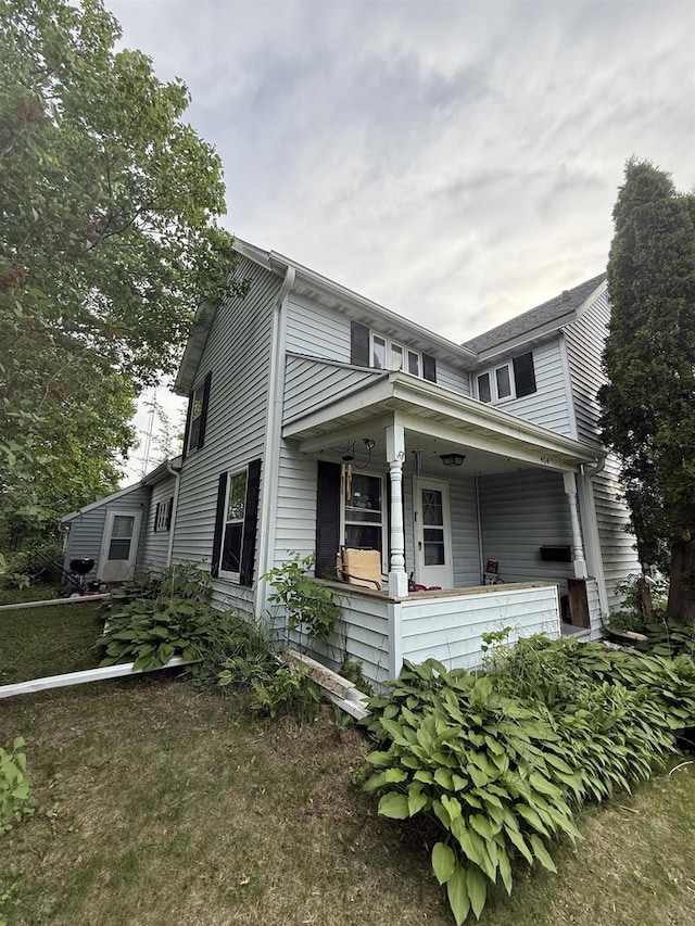 404 Prairie St, Mauston, WI 53948 - view of front of home featuring covered porch