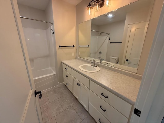 1028 Chauncey St, Eau Claire, WI 54701 - bathroom featuring vanity, bathing tub / shower combination, and tile patterned floors