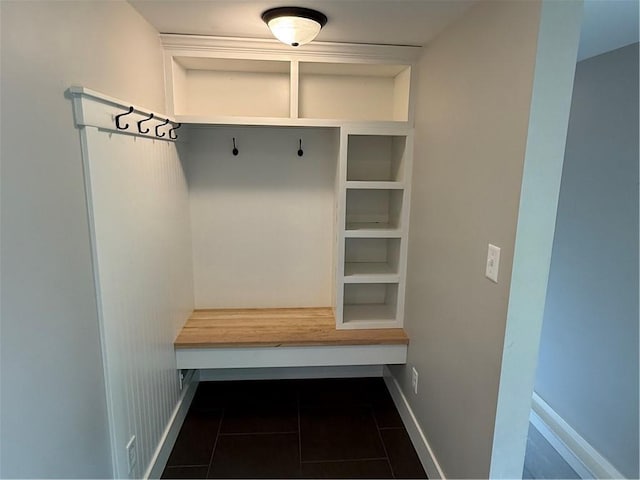 1028 Chauncey St, Eau Claire, WI 54701 - mudroom with baseboards and dark tile patterned flooring