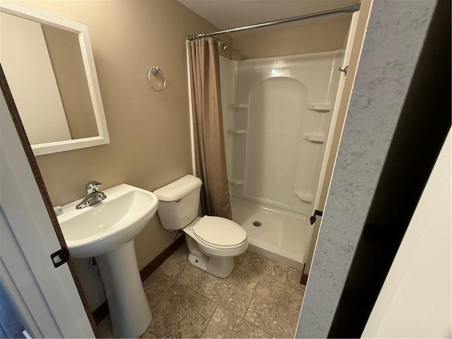 1028 Chauncey St, Eau Claire, WI 54701 - bathroom featuring a shower with shower curtain and tile patterned flooring