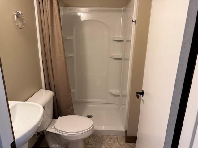 1028 Chauncey St, Eau Claire, WI 54701 - bathroom featuring a shower with shower curtain and tile patterned flooring
