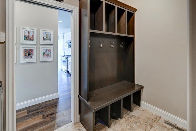 6586 Wolf Hollow Rd, Windsor, WI 53598 - mudroom with baseboards and wood finished floors