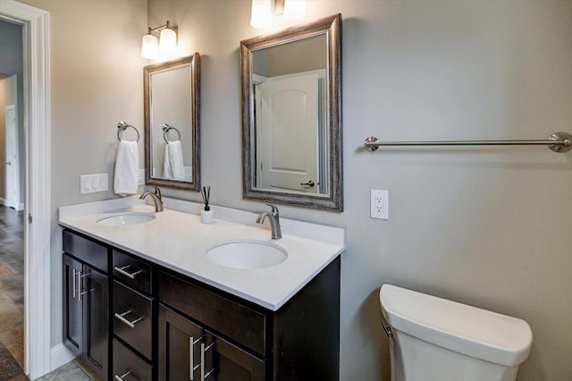 6586 Wolf Hollow Rd, Windsor, WI 53598 - bathroom featuring double vanity and toilet