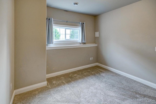 6586 Wolf Hollow Rd, Windsor, WI 53598 - spare room featuring carpet flooring and baseboards