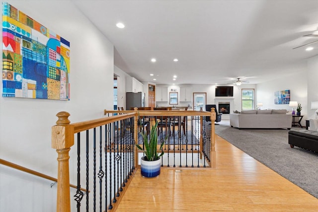 705 E Mason Dr, Edgerton, WI 53534 - hall featuring an upstairs landing, light wood-style flooring, and recessed lighting