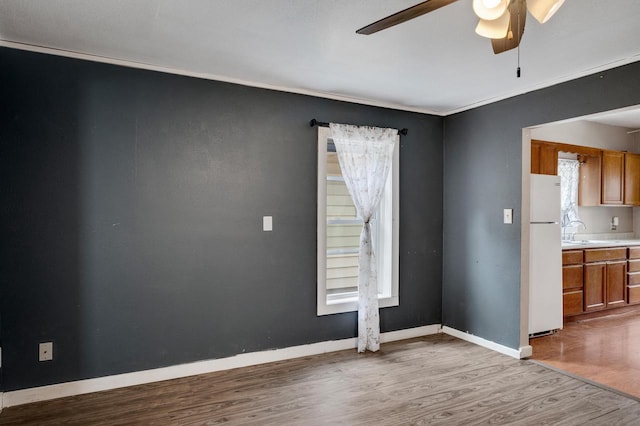 1413 Avon St, La Crosse, WI 54603 - spare room with ceiling fan and wood finished floors