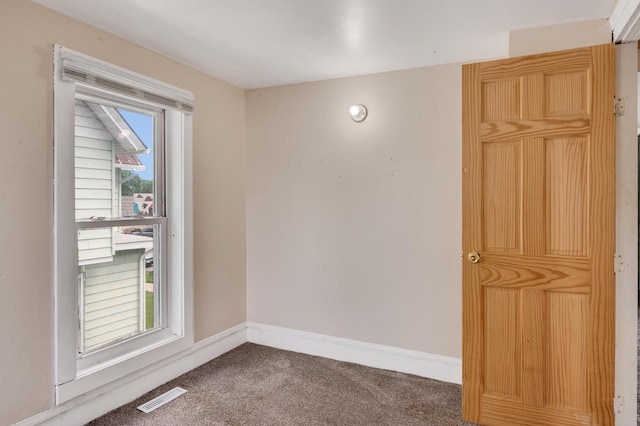 1413 Avon St, La Crosse, WI 54603 - empty room featuring carpet and baseboards