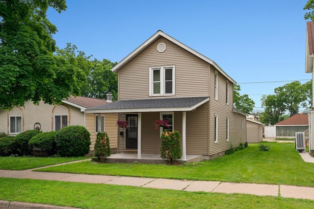1413 Avon St, La Crosse, WI 54603 - view of front facade with a porch and a front lawn