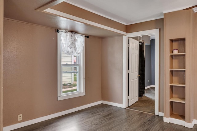 1413 Avon St, La Crosse, WI 54603 - empty room featuring dark wood-style floors and built in features