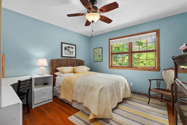 5026 Coney Weston Pl, Madison, WI 53711 - bedroom featuring wood finished floors, an office area, and a ceiling fan