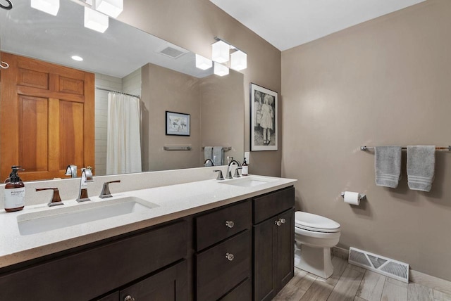 5026 Coney Weston Pl, Madison, WI 53711 - bathroom with double vanity, a shower with shower curtain, and wood finished floors