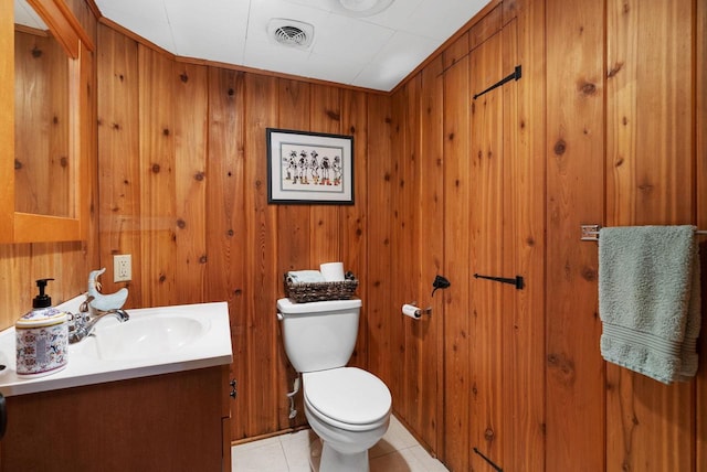 5026 Coney Weston Pl, Madison, WI 53711 - half bathroom featuring vanity, tile patterned floors, and wooden walls