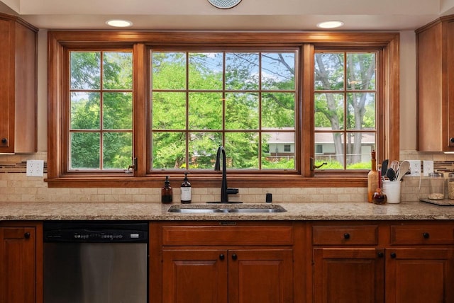 5026 Coney Weston Pl, Madison, WI 53711 - kitchen with stainless steel dishwasher, backsplash, light stone counters, and recessed lighting