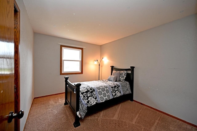 W355N5843 Bridle Ln, Oconomowoc, WI 53066 - carpeted bedroom featuring baseboards
