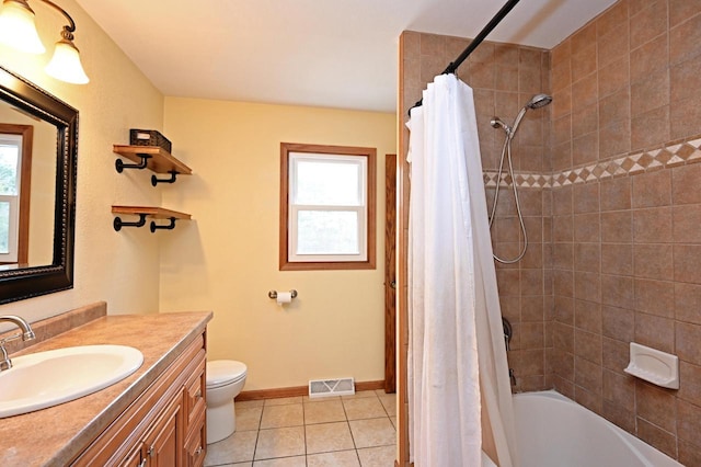 W355N5843 Bridle Ln, Oconomowoc, WI 53066 - full bathroom featuring healthy amount of natural light, vanity, tile patterned floors, and shower / bath combination with curtain
