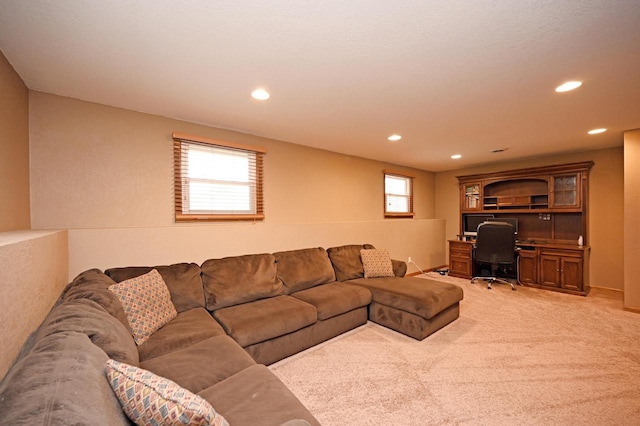 W355N5843 Bridle Ln, Oconomowoc, WI 53066 - living area with an office area, recessed lighting, and light colored carpet