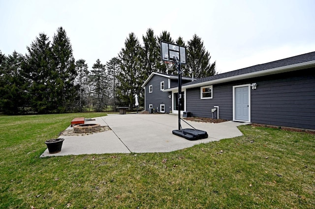 W355N5843 Bridle Ln, Oconomowoc, WI 53066 - view of patio with an outdoor fire pit