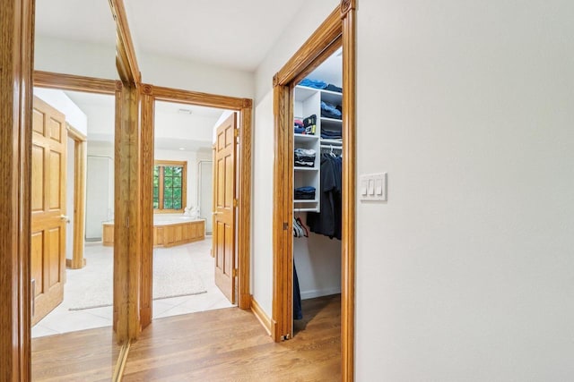 W332S9291 Red Brae Dr, Mukwonago, WI 53149 - hallway with light wood-style floors and baseboards